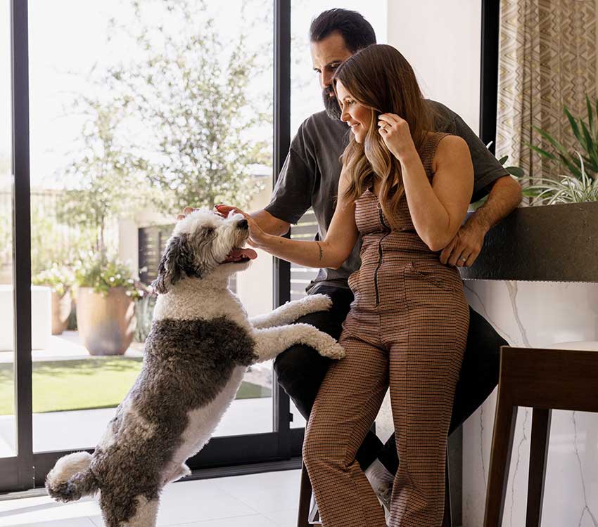 couple enjoying a newly renovated kitchen